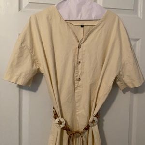 Ecru jumpsuit, never worn. Didn’t fit my daughter.